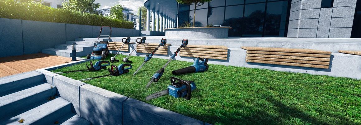 Verschiedene Bosch Pro Gartengeräte in einem Garten